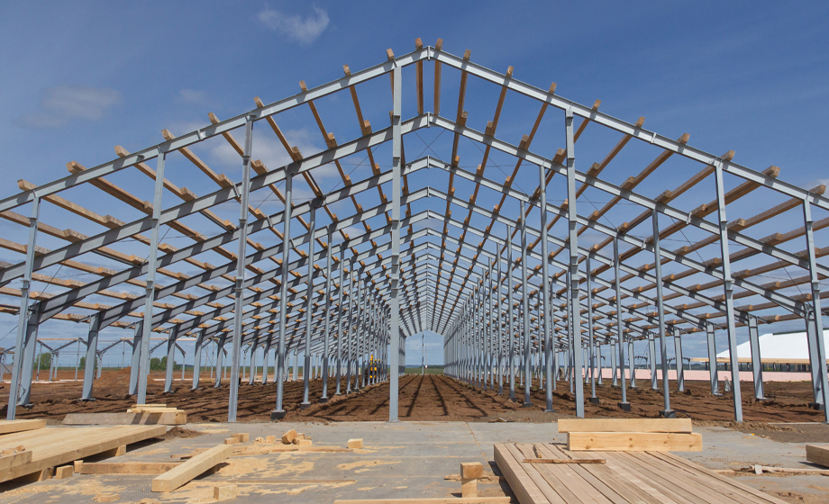 the inside image of a newely built metal frame building.